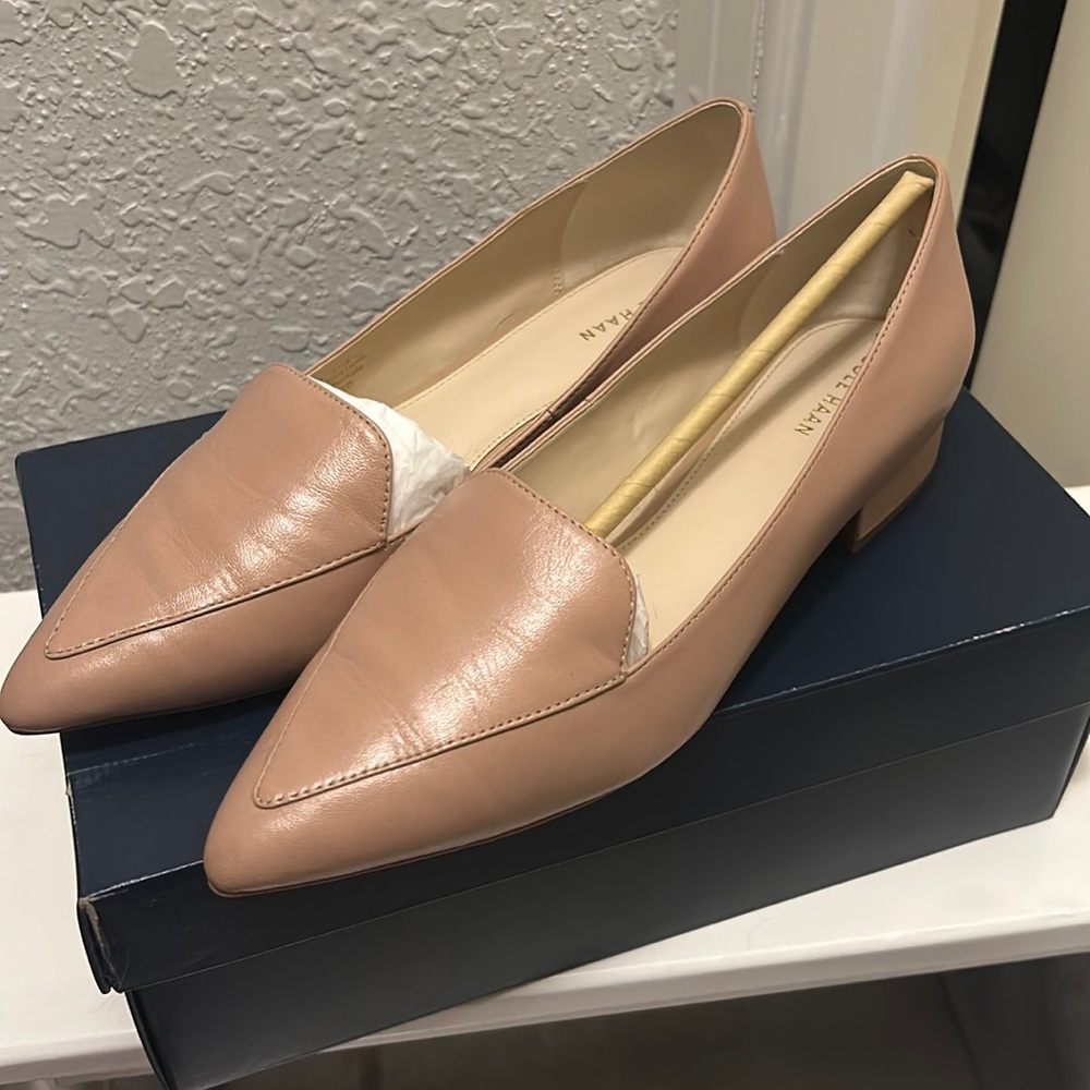 Brand New Cole Haan tan flats.